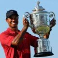 Tiger Woods holding up a trophy