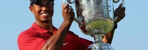 Tiger Woods holding up a trophy